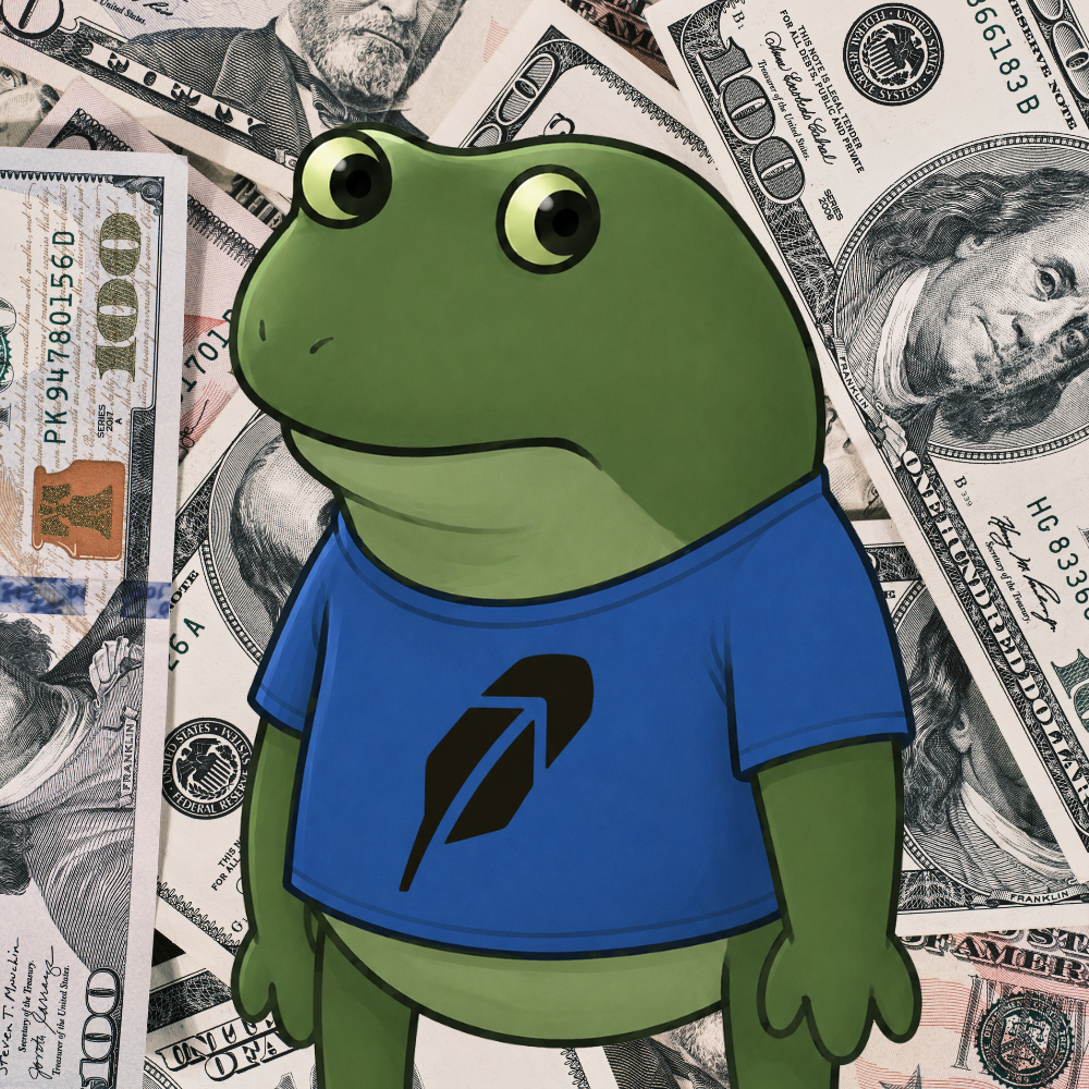 Frogecoin in front of dollar bills